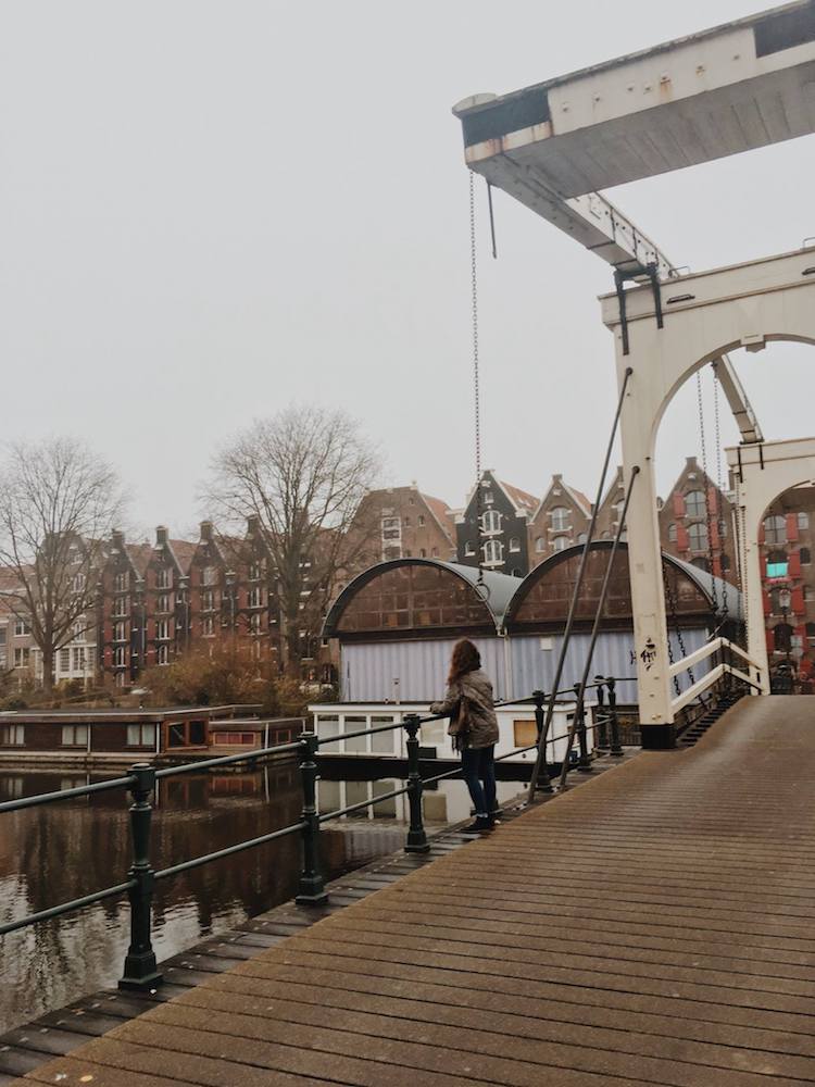 Photo of Prinseneiland neighborhood in Amsterdam. This neighborhood is one of best secret places to visit in Amsterdam with lots of secret spots to explore and history. Read more about secret Amsterdam here! #travel #Amsterdam #Netherlands