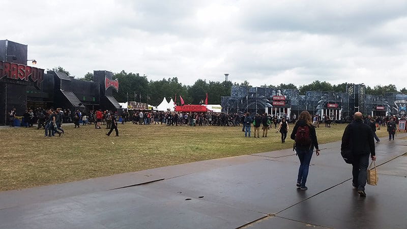 People walking along the grounds of Graspop (GMM).