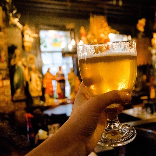 Beer at Het Elfde Gebod, one of the craziest cafes in Antwerp, Belgium. This unique cafe must be on your Antwerp Itinerary! #travel #beer #antwerp