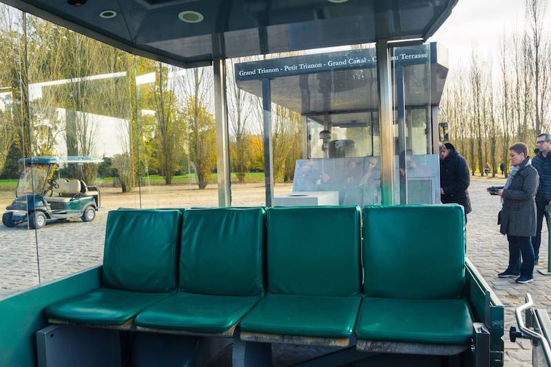 Tram on the grounds of Versailles. Read tips for seeing the grounds of Versailles and visiting Versailles. 