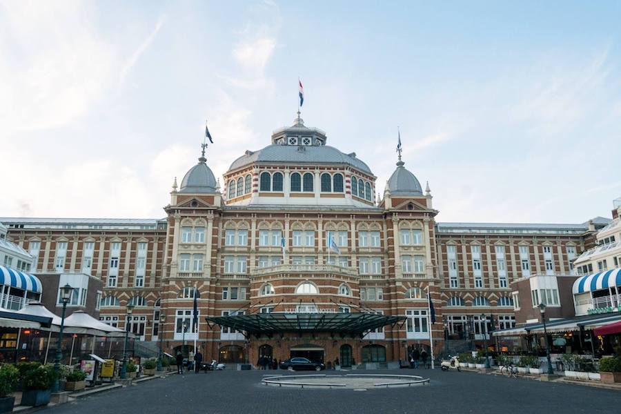 Kurhaus, one of the landmarks of Scheveningen beach resort. Read where to find parking in Scheveningen in this complete guide to Scheveningen. #travel #Scheveningen 