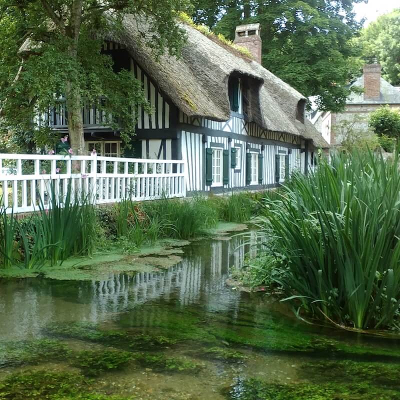 Photo of Veules-les-Roses, one of the most beautiful villages in Normandy. If you're planning a road trip in Normandy, you must stop off at this beautiful town in France! #france #normandy #europe #travel