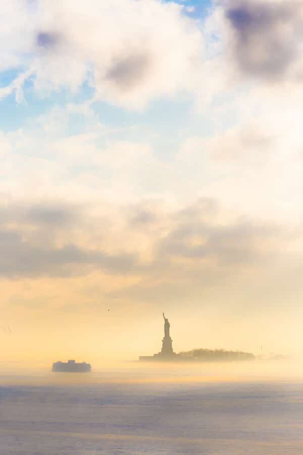 Photo of the Statue of Liberty and Staten Island Ferry, one of the best things to do in New York City in one day. #travel #NYC #NewYork