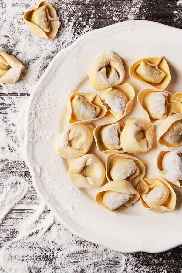 Cappellacci di zucca, pumpkin dumplings, a popular dish to eat in Emilia Romagna, Italy!