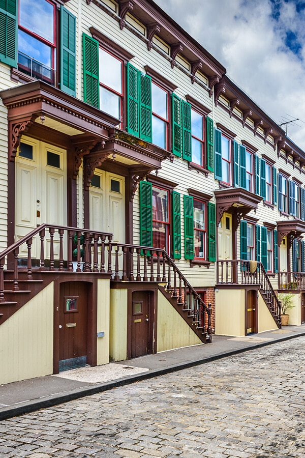 Sylvan Terrace is one of the most beautiful streets in New York City for seeing a glimpse of secret New York.  This beautiful dead-end is worth the subway trip up to Washington Heights! #manhattan #travel #NewYork #NYC #NewYorkCIty