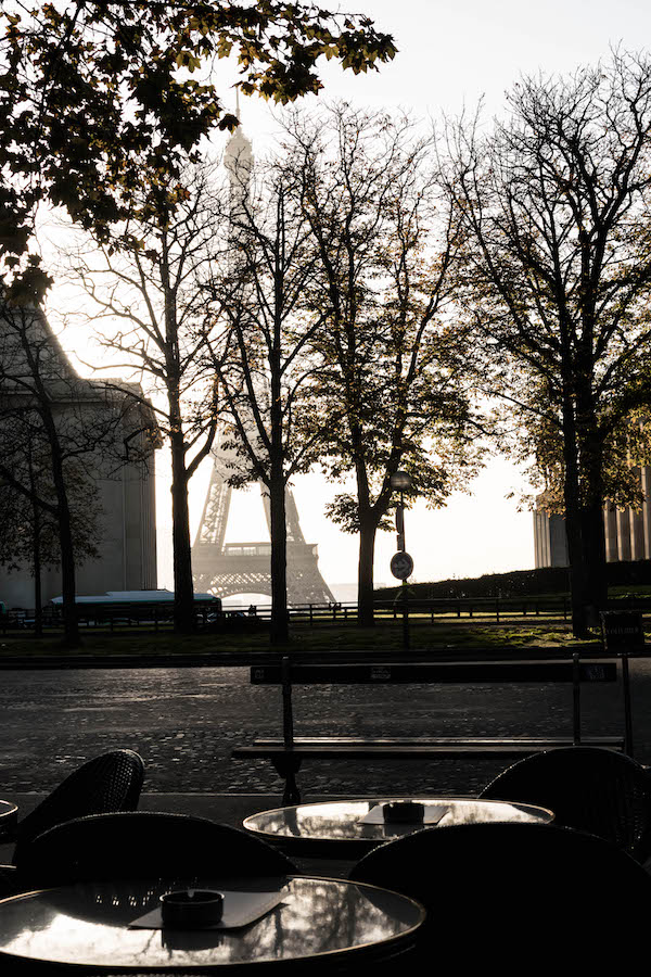 View of Eiffel Tower from cafe. Read what to do in Paris with the perfect Paris guide with everything you need to know before your trip to Paris! #travel #paris #europe #france