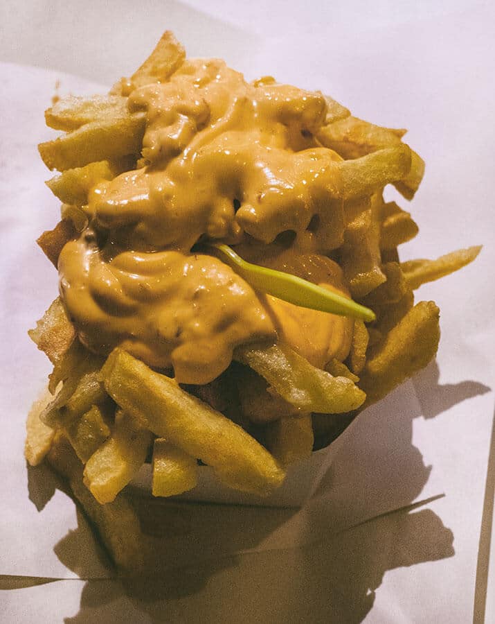 Belgian frites in Gent, Belgium. Trying the local food is a must-do!