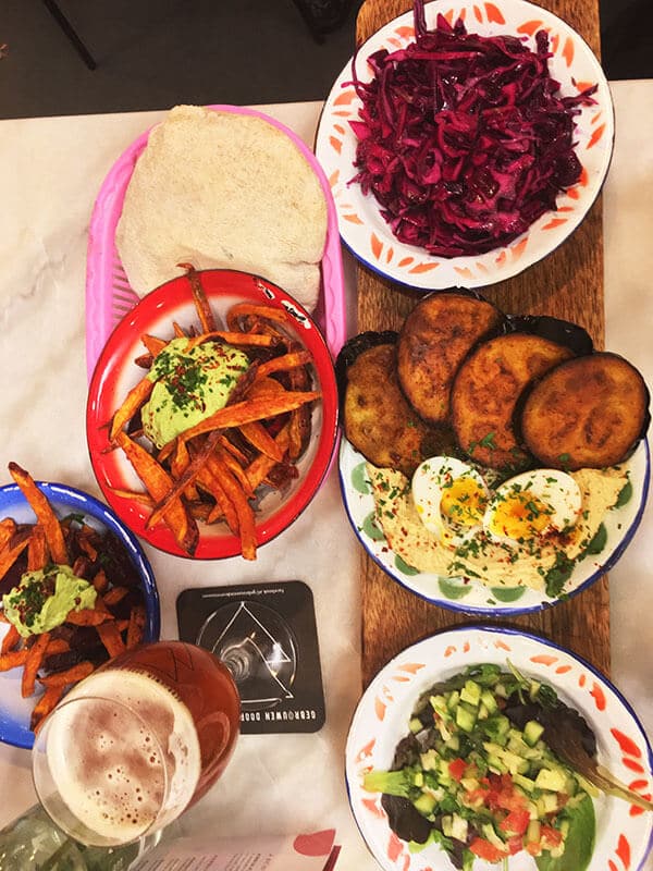 Delicious dinner at Hummus in Delft.  This vegan-friendly restaurant in Delft is one of the best places to eat in Delft! #travel #delft #holland