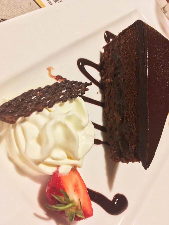 Chocolate cake (Sachertorte) in Salzburg, Austria. This cake is famous in Salzburg, Austria! #austria