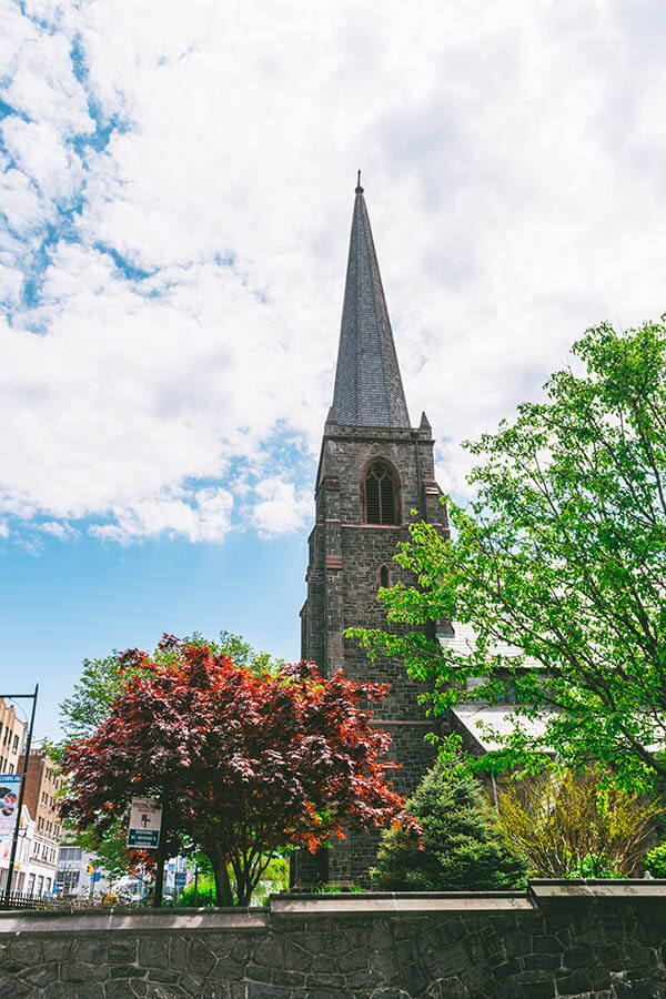 Historic English church in Flushing, Queens, New York City on a beautiful day