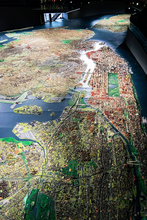 View of Manhattan and the Bronx from above at the Panorama of the City of New York.  This miniature of New York is a great family-friendly exhibition in New York City! #travel #NYC #NewYork #Manhattan