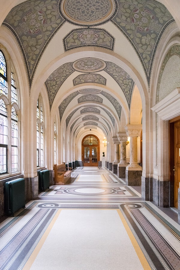 The beautiful interior of the Peace Palace on a tour of the interior.  This beautiful UN building in the Hague is worth touring! #holland #travel #denhaag