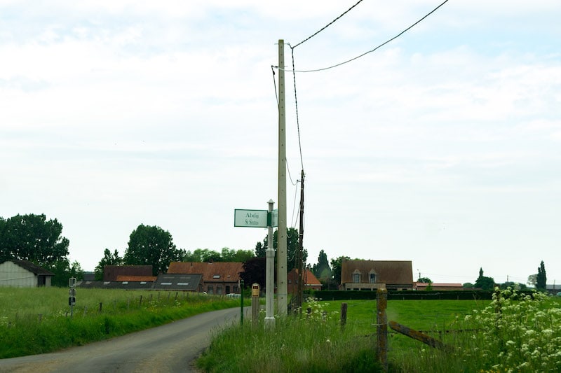 Sign marking the way to the Westvleteren abbey in Westvleteren, Belgium. Read what it's like to visit the Westvleteren Abbey. 